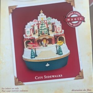 City Sidewalks Holiday Decor with Music and Motion